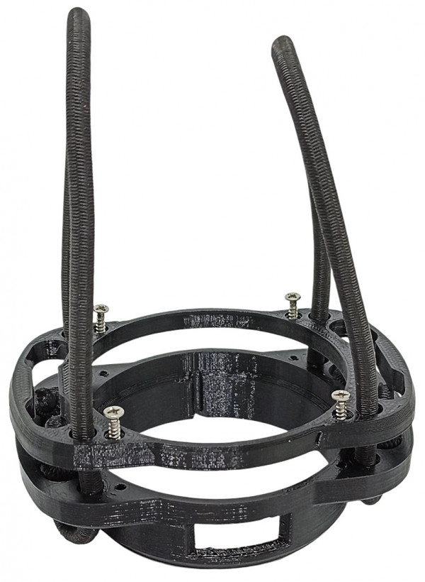 Держатель имеет съемную крышку снизу, прибор устанавливается внутрь и надежно зажимается этой крышкой, притянутой нержавеющими болтами (входят в комплект).