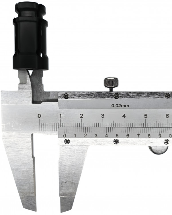 Внутренний диаметр со стороны посадки на ствол - около 12мм.